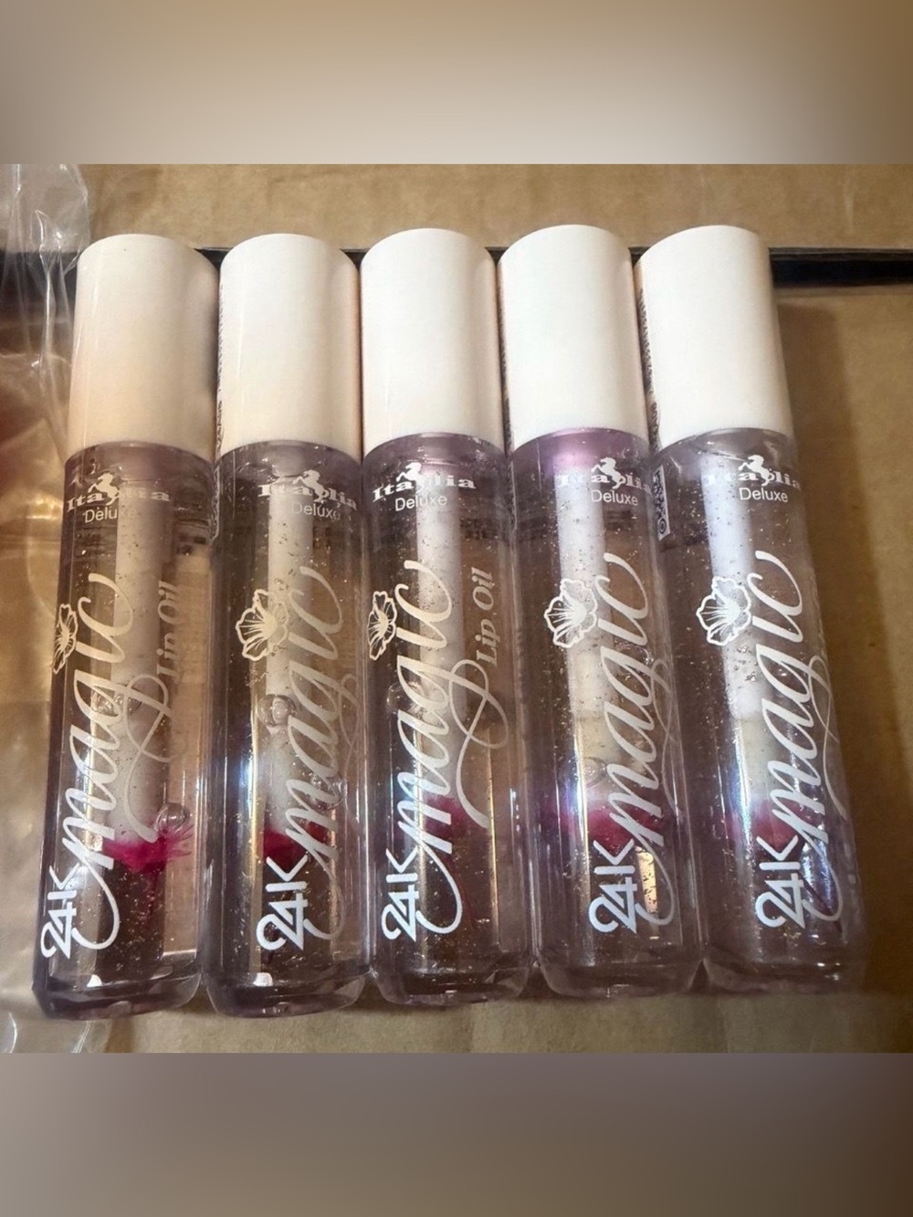 A Bundle Of 5 Of 24 Magic Lip Oil - New And Sealed